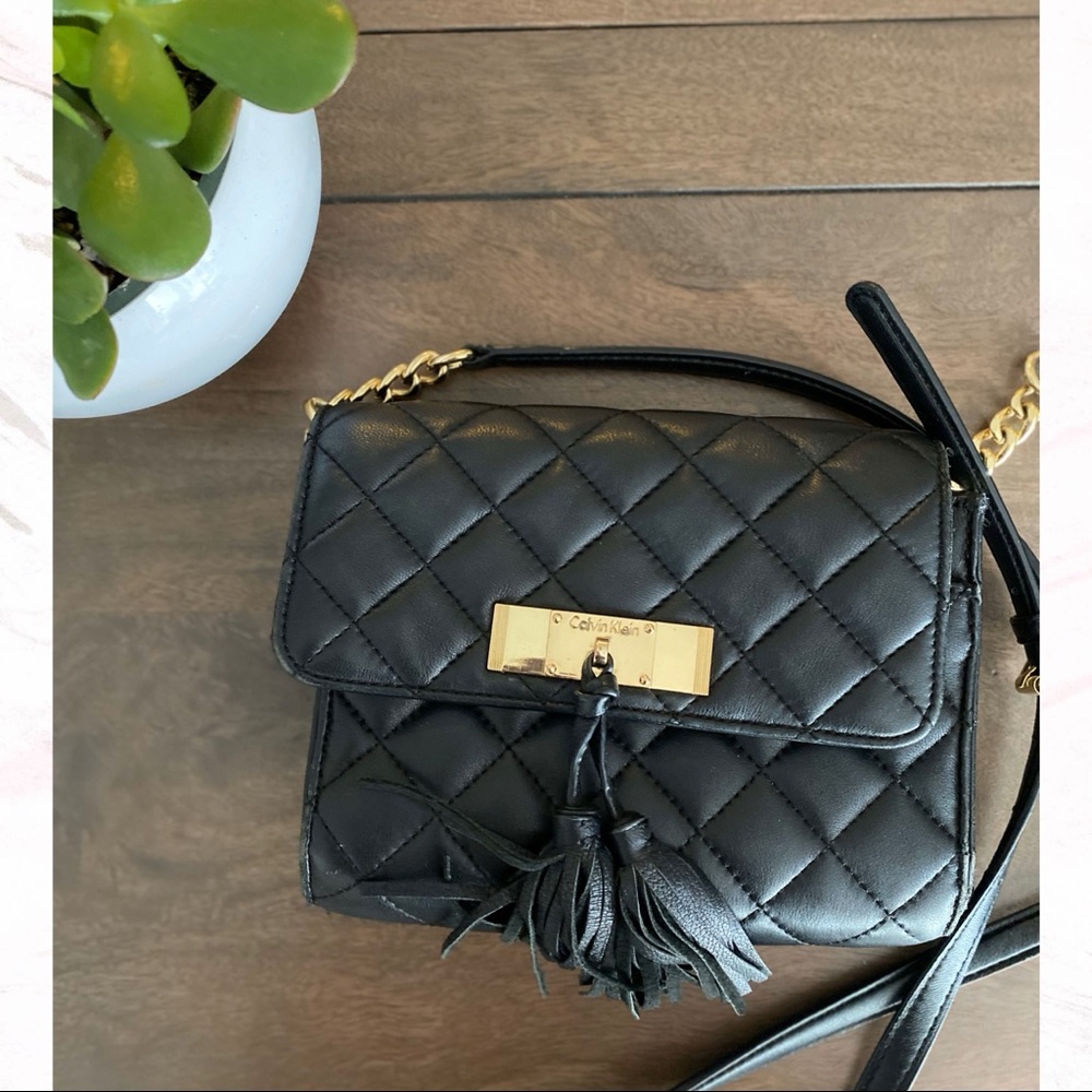 Black Calvin Klein crossbody with tassels